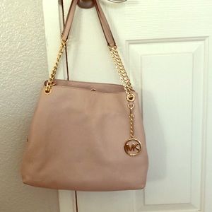 Rose gold Michael Kors purse